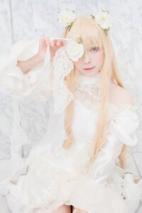 Rating: Safe Score: 0 Tags: 1girl bangs blonde_hair blurry blurry_foreground depth_of_field dress flower kirakishou lips long_hair looking_at_viewer sitting solo white_dress User: admin