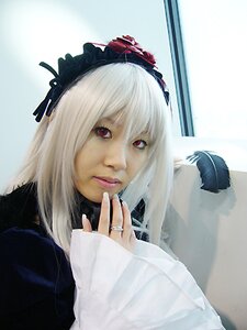 Rating: Safe Score: 0 Tags: 1girl bangs closed_mouth feathers hairband jewelry lips long_hair long_sleeves looking_at_viewer nail_polish red_eyes ring solo suigintou white_hair User: admin