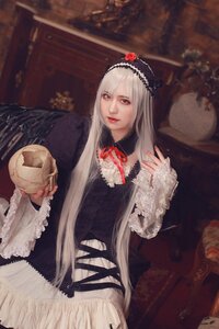 Rating: Safe Score: 0 Tags: 1girl chair dress flower frills gothic_lolita hairband lolita_fashion long_hair long_sleeves looking_at_viewer red_eyes ribbon rose silver_hair sitting solo suigintou wings User: admin