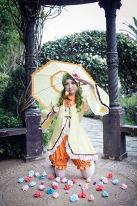 Rating: Safe Score: 0 Tags: 1girl dress flower holding_umbrella kanaria parasol petals solo tree umbrella water User: admin