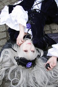 Rating: Safe Score: 0 Tags: 1girl black_dress dress flower frills gothic_lolita hairband lips lolita_fashion long_hair long_sleeves looking_at_viewer lying red_eyes rose silver_hair smile solo suigintou very_long_hair User: admin