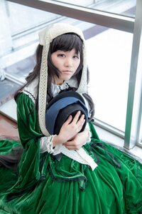 Rating: Safe Score: 0 Tags: 1girl bangs black_hair blue_eyes blurry depth_of_field dress green_dress hat hat_removed headwear_removed heterochromia holding indoors lace long_hair long_sleeves solo suiseiseki window User: admin
