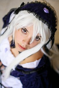 Rating: Safe Score: 0 Tags: 1girl blurry blurry_background blurry_foreground closed_mouth depth_of_field hairband lips lolita_hairband looking_at_viewer motion_blur photo solo suigintou white_hair User: admin