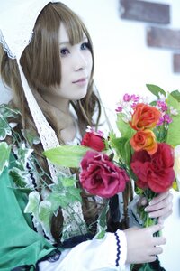 Rating: Safe Score: 0 Tags: 1girl blue_eyes blurry bouquet brown_hair depth_of_field flower lips long_hair photo red_flower red_rose rose solo suiseiseki User: admin