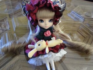 Rating: Safe Score: 0 Tags: 1girl blonde_hair blue_eyes bonnet bookshelf bow building doll dress flower indoors long_hair looking_at_viewer photo red_dress rose shinku solo stuffed_animal User: admin