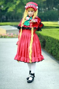 Rating: Safe Score: 0 Tags: 1girl blonde_hair blue_eyes blurry bonnet bow dress full_body long_hair long_sleeves looking_at_viewer outdoors pantyhose photo red_dress shinku shoes solo standing white_legwear User: admin