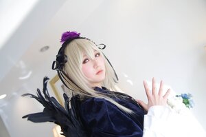 Rating: Safe Score: 0 Tags: 1girl blonde_hair blurry closed_mouth depth_of_field feathers flower hair_flower hair_ornament lips long_sleeves looking_at_viewer ribbon solo suigintou upper_body wings User: admin