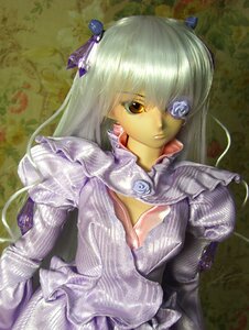 Rating: Safe Score: 0 Tags: 1girl barasuishou doll dress frills long_hair ribbon solo traditional_media User: admin