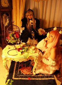 Rating: Safe Score: 0 Tags: 2girls cage curtains dress flower food long_hair multiple_cosplay multiple_girls pastry rose sitting tagme tea teacup User: admin