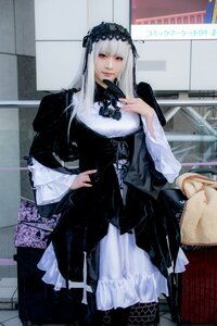 Rating: Safe Score: 0 Tags: 1girl dress gothic_lolita hairband lolita_fashion long_hair long_sleeves looking_at_viewer red_eyes sitting solo suigintou User: admin