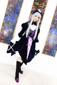 Rating: Safe Score: 0 Tags: 1girl black_dress dress flower frills gothic_lolita lolita_fashion long_hair long_sleeves looking_at_viewer solo standing suigintou User: admin