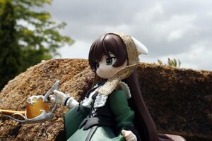 Rating: Safe Score: 0 Tags: 1girl apron blurry brown_hair cup depth_of_field doll dress food green_eyes heterochromia long_hair long_sleeves outdoors solo suiseiseki very_long_hair User: admin