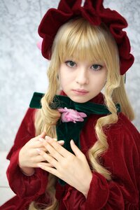 Rating: Safe Score: 0 Tags: 1girl bangs blonde_hair blue_eyes blurry closed_mouth depth_of_field flower hands_together hat lips long_hair long_sleeves looking_at_viewer own_hands_together realistic shinku solo upper_body User: admin