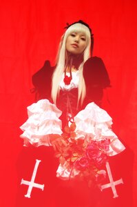 Rating: Safe Score: 0 Tags: 1girl bangs blonde_hair dress flower lips long_hair long_sleeves red_background red_theme simple_background solo suigintou User: admin