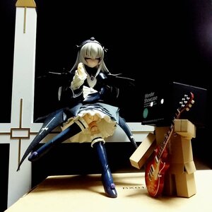Rating: Safe Score: 0 Tags: 1girl boots closed_eyes doll dress frills instrument long_hair long_sleeves sitting solo suigintou thighhighs User: admin