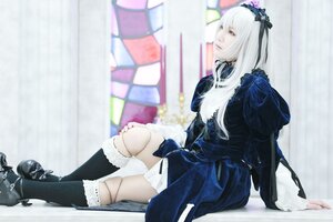 Rating: Safe Score: 0 Tags: 1girl black_footwear black_legwear blurry blurry_background boots depth_of_field doll_joints dress frills gothic_lolita hairband long_hair long_sleeves photo ribbon silver_hair sitting solo suigintou white_hair User: admin