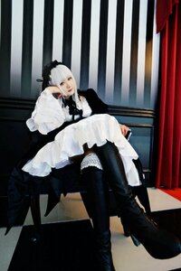 Rating: Safe Score: 0 Tags: 1girl argyle black_legwear boots chair checkered checkered_floor crossed_legs dress frills high_heels lips sitting solo suigintou white_hair User: admin