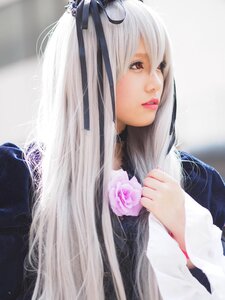 Rating: Safe Score: 0 Tags: 1girl bangs black_ribbon flower hair_ornament hair_ribbon lips long_hair looking_at_viewer red_eyes ribbon silver_hair solo suigintou upper_body User: admin