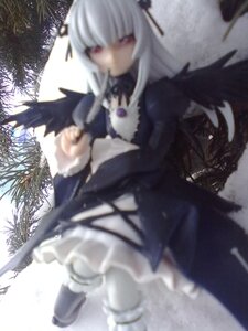 Rating: Safe Score: 0 Tags: 1girl bangs black_dress black_wings blurry blurry_foreground boots depth_of_field doll dress long_hair long_sleeves plant sitting solo suigintou tree wings User: admin