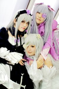 Rating: Safe Score: 0 Tags: 3girls dress eyepatch flower frills lips long_hair long_sleeves looking_at_viewer multiple_cosplay multiple_girls photo siblings smile suigintou tagme User: admin