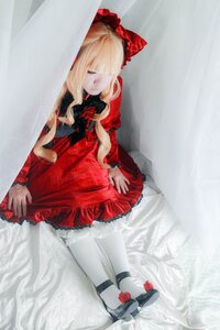 Rating: Safe Score: 0 Tags: 1girl blonde_hair bow closed_eyes doll_joints dress flower long_hair red_dress ribbon rose shinku shoes sitting solo white_legwear User: admin