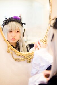 Rating: Safe Score: 0 Tags: 1girl blurry blurry_background blurry_foreground depth_of_field dress hairband lips long_hair long_sleeves looking_at_viewer photo red_eyes ribbon rose silver_hair solo suigintou User: admin