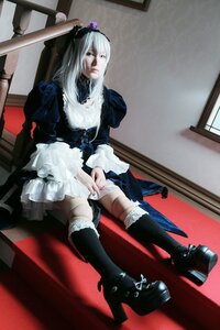 Rating: Safe Score: 0 Tags: 1girl boots dress frills gothic_lolita high_heels lips long_hair realistic sitting solo suigintou User: admin