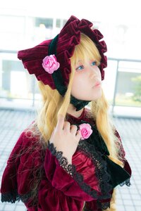 Rating: Safe Score: 0 Tags: 1girl blonde_hair blue_eyes blurry bonnet depth_of_field dress flower frills hat lips lolita_fashion long_hair long_sleeves outdoors photo pink_flower pink_rose rose shinku solo User: admin