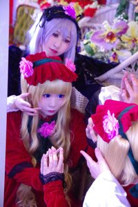 Rating: Safe Score: 0 Tags: 2girls blonde_hair blue_eyes blurry blurry_foreground depth_of_field dress flower long_hair looking_at_viewer multiple_cosplay multiple_girls photo realistic red_dress rose tagme User: admin