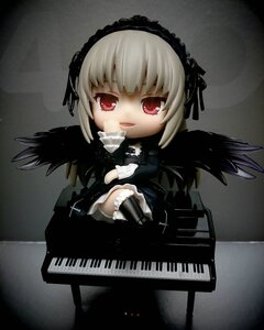 Rating: Safe Score: 0 Tags: 1girl black_dress black_wings boots chibi doll dress feathered_wings feathers hairband instrument looking_at_viewer red_eyes silver_hair sitting smile solo suigintou wings User: admin