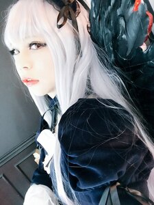 Rating: Safe Score: 0 Tags: 1girl bangs closed_mouth eyelashes lips long_hair ribbon solo suigintou upper_body white_hair User: admin