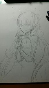 Rating: Safe Score: 0 Tags: 1girl dress greyscale hair_ribbon image letterboxed long_hair long_sleeves looking_at_viewer monochrome ribbon shinku sketch smile solo traditional_media User: admin