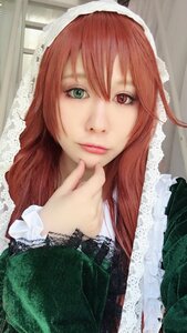 Rating: Safe Score: 0 Tags: 1girl green_eyes heterochromia lace lips long_hair looking_at_viewer red_eyes red_hair smile solo suiseiseki User: admin