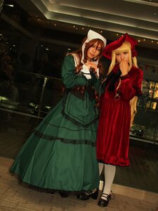 Rating: Safe Score: 0 Tags: 2girls blonde_hair blue_eyes brown_hair dress green_dress hood long_hair multiple_cosplay multiple_girls standing tagme User: admin