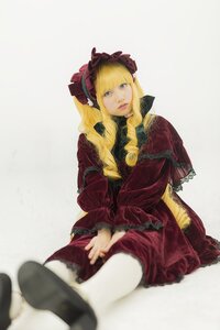 Rating: Safe Score: 0 Tags: 1girl blonde_hair blue_eyes blurry bonnet depth_of_field dress drill_hair lips long_hair long_sleeves looking_at_viewer photo realistic red_dress shinku sitting solo User: admin
