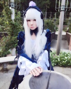 Rating: Safe Score: 0 Tags: 1girl 3d dress long_hair long_sleeves looking_at_viewer outdoors plant red_eyes solo suigintou tree white_hair User: admin