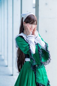 Rating: Safe Score: 0 Tags: 1girl bangs blurry blurry_background brown_hair depth_of_field dress frills green_dress hands_on_own_face long_hair long_sleeves solo standing suiseiseki very_long_hair User: admin