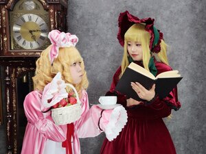 Rating: Safe Score: 0 Tags: 2girls blonde_hair book bow cup dress flower holding holding_book long_hair multiple_cosplay multiple_girls open_book pink_dress realistic tagme User: admin