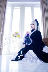 Rating: Safe Score: 0 Tags: 1girl bangs black_dress curtains dress flower frills indoors long_hair long_sleeves sitting solo suigintou window User: admin