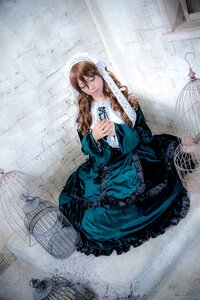 Rating: Safe Score: 0 Tags: 1girl birdcage blue_dress brown_hair cage dress frills lolita_fashion long_hair sitting smile solo User: admin