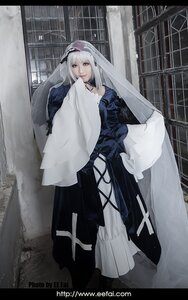 Rating: Safe Score: 0 Tags: 1girl bangs dress full_body grey_eyes long_hair looking_at_viewer rain solo standing suigintou white_hair wide_sleeves User: admin