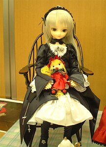 Rating: Safe Score: 0 Tags: 1girl black_eyes blonde_hair doll dress frills long_hair long_sleeves looking_at_viewer solo standing suigintou User: admin