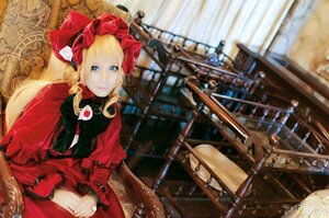 Rating: Safe Score: 0 Tags: 1girl blonde_hair blue_eyes blurry bonnet chair cup depth_of_field dress flower long_sleeves shinku sitting smile solo teacup User: admin