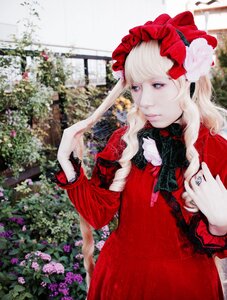 Rating: Safe Score: 0 Tags: 1girl blonde_hair blue_eyes blurry bonnet closed_mouth dress flower hair_flower hair_ornament lolita_fashion long_sleeves looking_at_viewer red_dress shinku solo User: admin