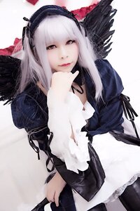 Rating: Safe Score: 0 Tags: 1girl bangs black_ribbon black_wings closed_mouth dress feathered_wings feathers hairband lips long_hair long_sleeves looking_at_viewer red_eyes ribbon rose smile solo suigintou wings User: admin