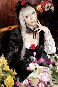 Rating: Safe Score: 0 Tags: 1girl black_dress blurry blurry_foreground depth_of_field dress flower gothic_lolita hairband lips lolita_fashion long_hair looking_at_viewer rose smile solo suigintou User: admin