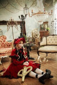 Rating: Safe Score: 0 Tags: 1girl blonde_hair dress long_hair red_dress shinku shoes sitting solo User: admin