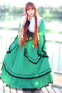 Rating: Safe Score: 0 Tags: 1girl brown_hair dress green_dress long_hair long_sleeves looking_at_viewer solo sunlight User: admin