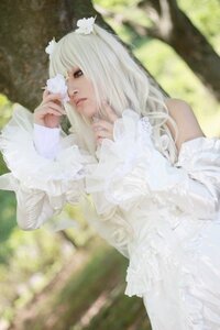 Rating: Safe Score: 0 Tags: 1girl bare_shoulders blurry depth_of_field dress frills kirakishou lace lips lolita_fashion long_hair outdoors sitting solo white_dress User: admin