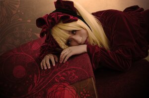 Rating: Safe Score: 0 Tags: 1girl blonde_hair bow dress flower hair_bow lips long_sleeves looking_at_viewer lying realistic ribbon shinku solo User: admin